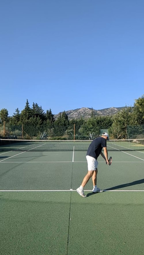 Playing tennis